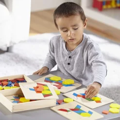 Bloques y tableros con motivos de aprendizaje - Melissa & Doug