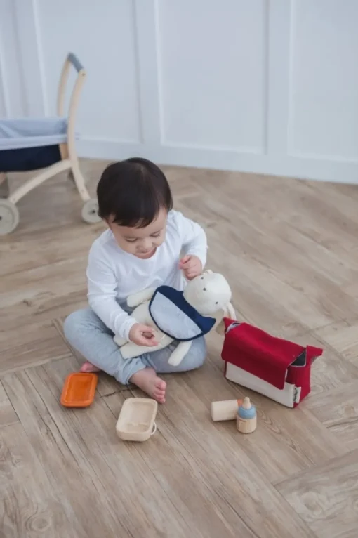 Juego de alimentación para muñecas - Plan Toys