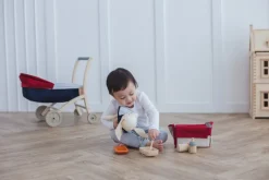 Juego de alimentación para muñecas - Plan Toys