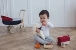 Juego de alimentación para muñecas - Plan Toys