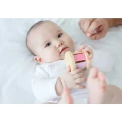 Sonajero musical en color pastel - Plan Toys